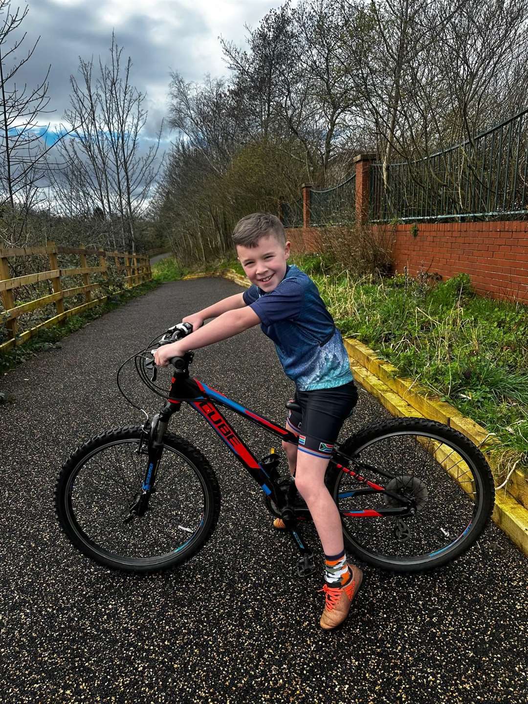 Harvey is trying to raise money for new bike sheds at his school (Naiomi Goodman/PA)